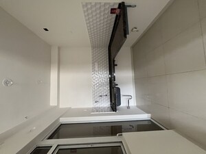Kitchen in 2 BHK Apartment at Godrej Green Cove, Mahalunge – for Rent