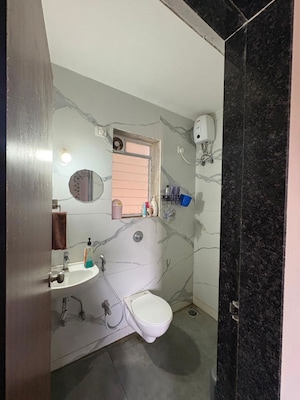 Bathroom in 1 BHK Apartment at Raunak 108, Kasarvadavali – for Rent