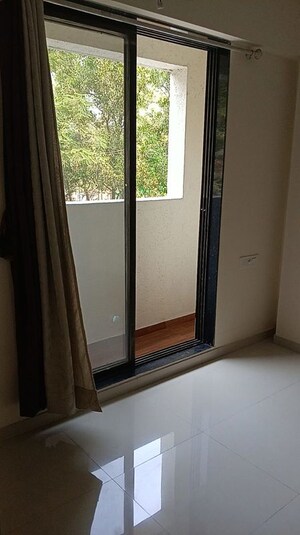 Room in 2 BHK Apartment at K M Horizon Palms 2, Owale – for Rent