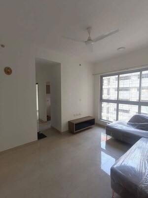 Living Room in 1.5 BHK Apartment at Piramal Revanta, Mulund West – for Rent