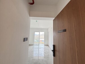 Building Lobby in 2 BHK Apartment at Welworth Purnam, Hinjewadi – for Rent