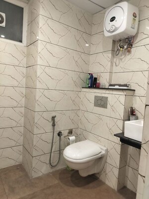 Bathroom in 3 BHK Apartment at Maxxus Elanza, International Airport Road – for Rent