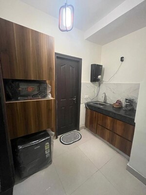 Kitchen in 2 BHK Apartment at Paramount Emotions, Sector 1 Greater Noida – for Rent