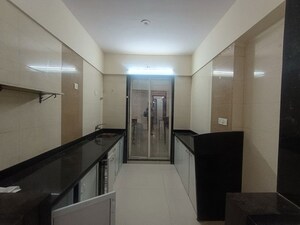 Kitchen in 2 BHK Apartment at Shanti Green Palms, Ghansoli – for Rent