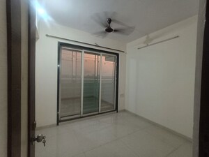 Bedroom in 2 BHK Apartment at Shanti Green Palms, Ghansoli – for Rent