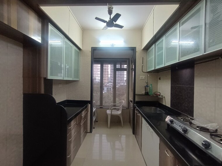 Kitchen, retro-avenue 2 Bedroom 1000 Sq.Ft. Apartment In Kopar Khairane Navi Mumbai 10413029