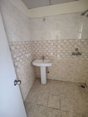 Bathroom in 2.5 BHK Apartment at Panchsheel Greens, Sector 16 Greater Noida – for Sale