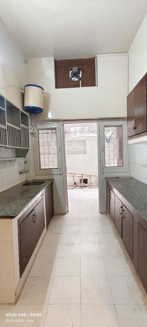 Kitchen in 2.5 BHK Apartment at Defence Colony – for Rent