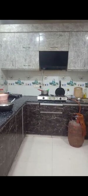 Kitchen in 2 BHK Apartment at Ansal Palam Triangle, Palam Vihar Extension – for Rent