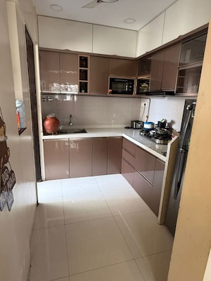 Kitchen in 2 BHK Apartment at Rama Parkland, Moshi – for Rent