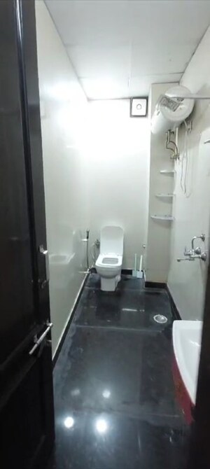 Bathroom in 2 BHK Apartment at Ansal Palam Triangle, Palam Vihar Extension – for Rent