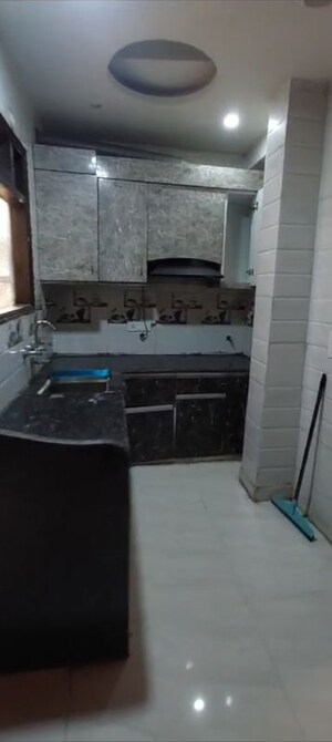 Kitchen in 2 BHK Apartment at Ansal Palam Triangle, Palam Vihar Extension – for Rent