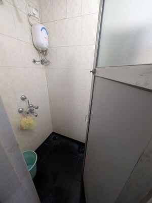 Bathroom in 2 BHK Apartment at Gokuldham Complex, Goregaon East – for Rent
