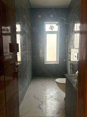 Bathroom in 3.5 BHK Apartment at ATS One Hamlet, Sector 104 – for Rent