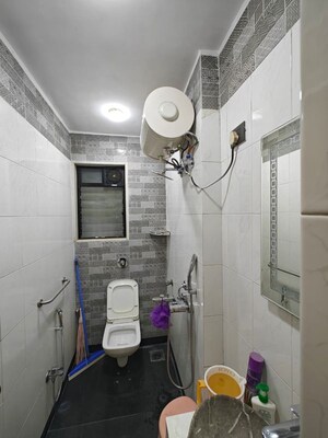 Bathroom in 2 BHK Apartment at Arihant CHS Khar West, Khar West – for Rent