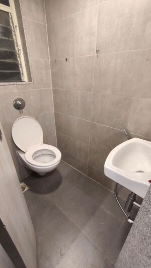 Bathroom in 1.5 BHK Apartment at Group Satellite Aarambh, Malad East – for Rent