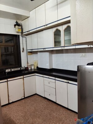 Kitchen in 2 BHK Apartment at DGS Sheetal Anupam, Malad West – for Rent
