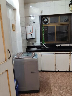 Kitchen in 2 BHK Apartment at DGS Sheetal Anupam, Malad West – for Rent