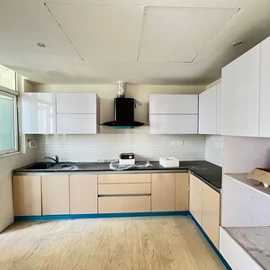 Kitchen in 3.5 BHK Apartment at Mahagun Mezzaria, Sector 78 – for Rent