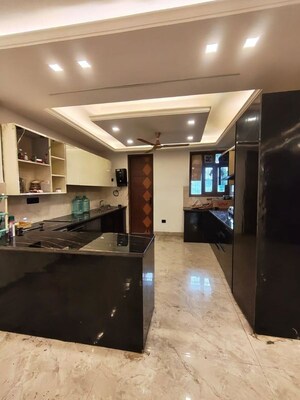 Kitchen in 3 BHK Builder Floor at Freedom Fighters Enclave – for Sale