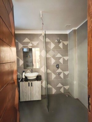 Bathroom in 3 BHK Builder Floor at Freedom Fighters Enclave – for Sale