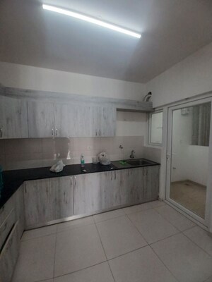 Kitchen in 3 BHK Apartment at Godrej Aqua, International Airport Road – for Rent
