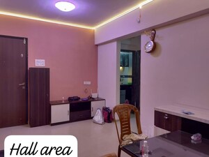 Living Room in 1 BHK Apartment at Maitri Planet NX, Kharghar – for Rent