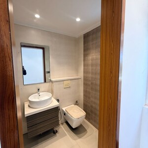 Bathroom in 3 BHK Apartment at ATS Kocoon, Babupur Village – for Rent