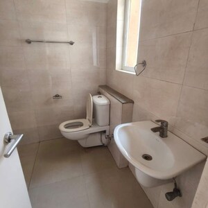 Bathroom in 3 BHK Apartment at ATS Kocoon, Babupur Village – for Rent