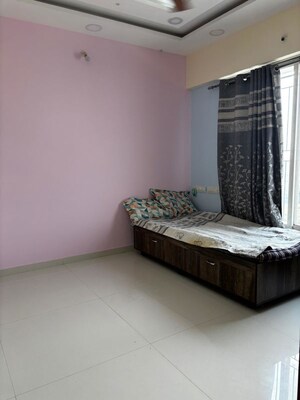 Bedroom in 2 BHK Apartment at Pristine Equilife Homes, Mahalunge Ingale – for Rent