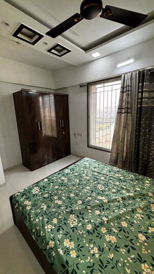 Bedroom in 2 BHK Apartment at Pristine Equilife Homes, Mahalunge Ingale – for Rent