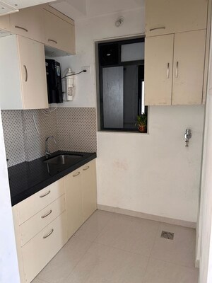 Kitchen in 2 BHK Apartment at APR Crown, Dombivli East – for Rent