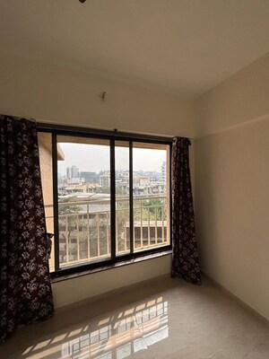 Bedroom in 2 BHK Apartment at Chaitanya Anand Lunkhod CHSL, Andheri West – for Rent