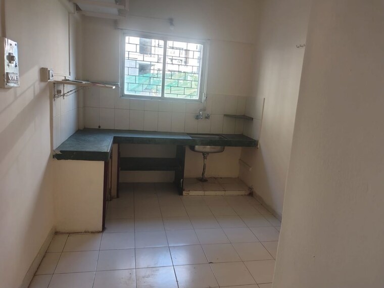 Kitchen, florida-county 1 Bedroom 600 Sq.Ft. Apartment In Mundhwa Pune 10413747