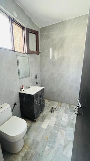 Bathroom in 3 BHK Builder Floor at Kalkaji – for Rent