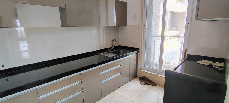 Kitchen, rosa-manhattan 3 Bedroom 950 Sq.Ft. Apartment In Ghodbunder Road Thane 10413871