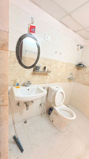 Bathroom in 3 BHK Apartment at Amrapali Kingswood, Sector 4 Greater Noida – for Rent