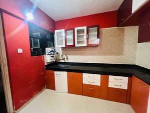 Kitchen in 2 BHK Apartment at Arihant Venkateshwara Green City, Hadapsar – for Rent