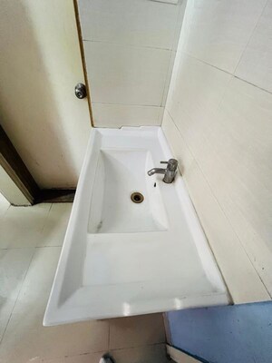 Bathroom in 2 BHK Apartment at Arihant Venkateshwara Green City, Hadapsar – for Rent
