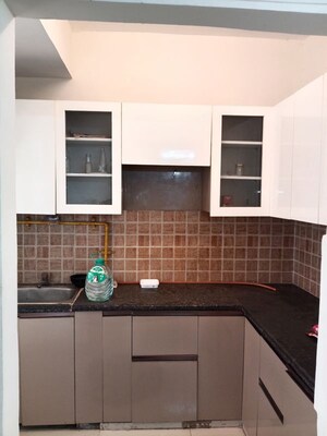 Kitchen in 2 BHK Apartment at Mahagun Mywoods III, Sector 16c Greater Noida – for Rent