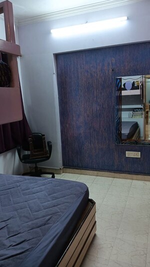 Room in 2 BHK Apartment at Abrol Krishna Utsav, Malad West – for Rent