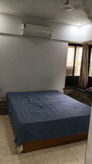 Bedroom in 2 BHK Apartment at Abrol Krishna Utsav, Malad West – for Rent
