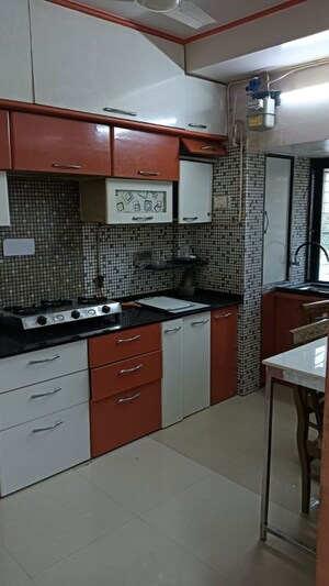 Kitchen in 2 BHK Apartment at Abrol Krishna Utsav, Malad West – for Rent