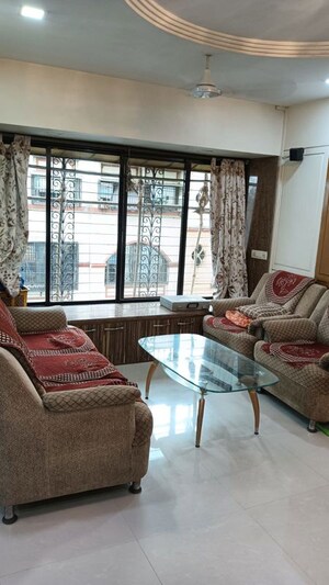 Living Room in 2 BHK Apartment at Abrol Krishna Utsav, Malad West – for Rent
