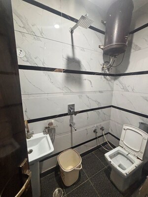 Bathroom in 2.5 BHK Builder Floor at Dwarka Mor – for Rent