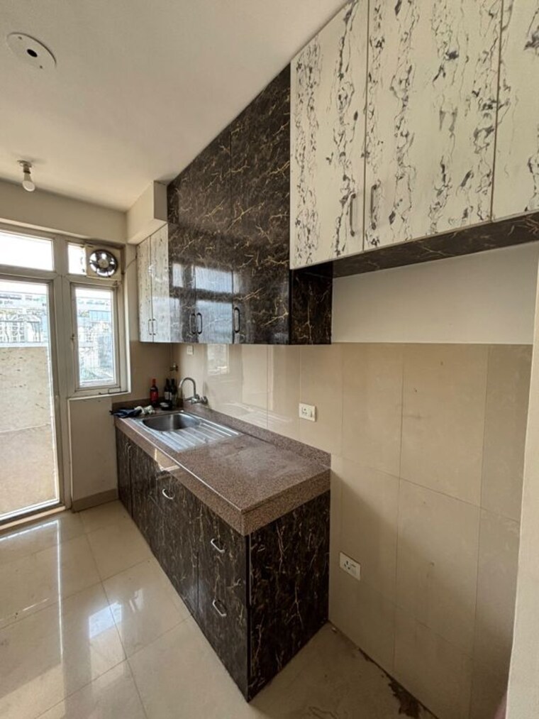 Kitchen, emaar-emerald-estate 2.5 Bedroom 950 Sq.Ft. Apartment In Sector 65 Gurgaon 10413972