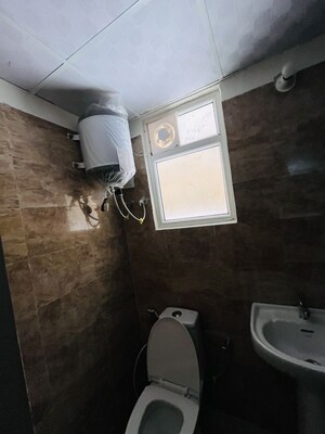 Bathroom in 1 BHK Apartment at Kingson ARV Arcade, Raj Nagar Extension – for Rent