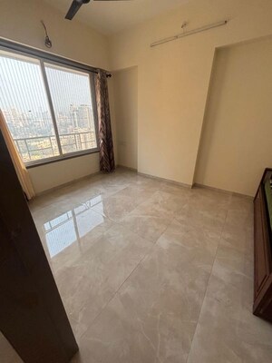 Room in 2 BHK Apartment at Harshail Hornbill, Malad West – for Rent