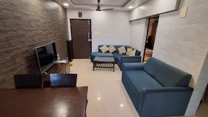 Living Room in 2 BHK Apartment at Savera CHS Borivali West, Borivali West – for Sale