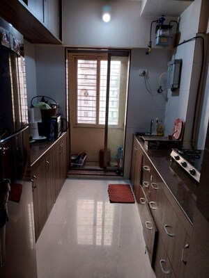 Kitchen in 2 BHK Apartment at Neelkanth Greens, Manpada – for Rent